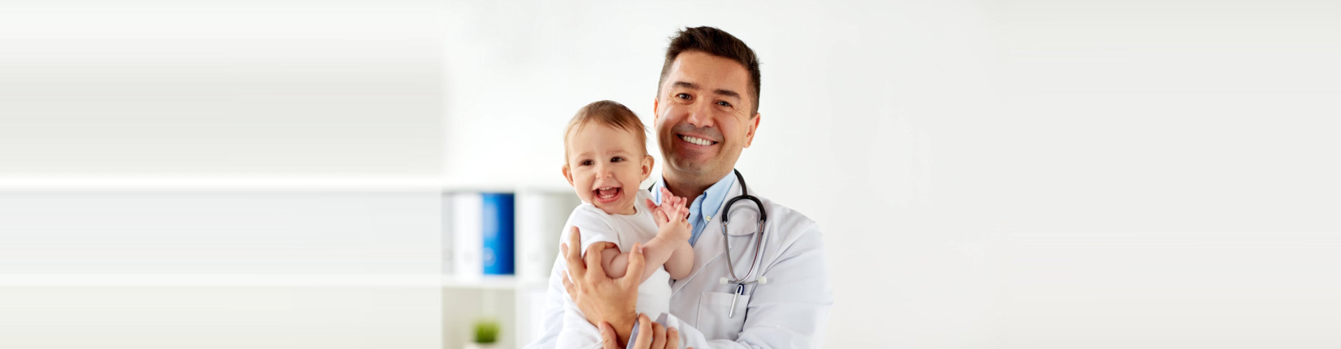 doctor and a kid smiling